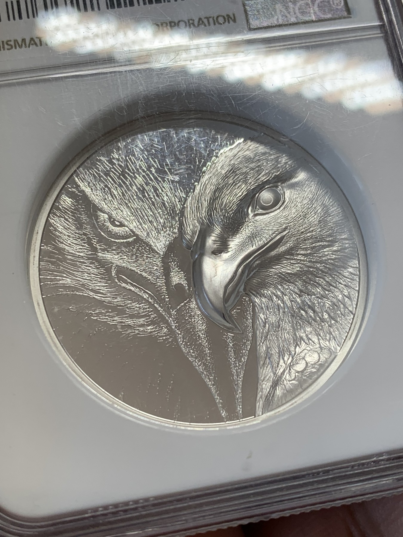 《竞宝斋》第207场-周日，周一 2场 (全场包邮) NGC PF70 满分 蒙古2020双面高浮雕雄鹰1盎司 31.1克 999银 克劳斯世界硬币大奖最佳创意币提名