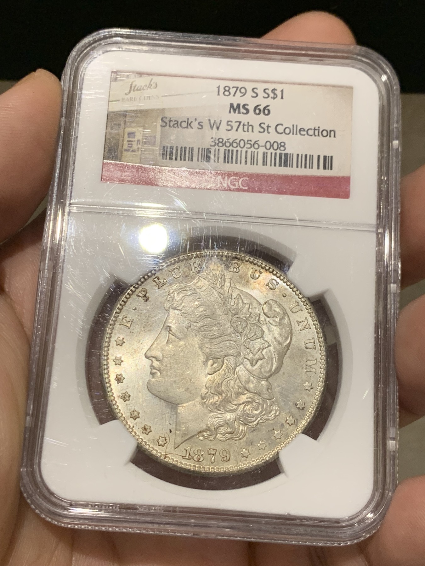 《竞宝斋》第207场-周日，周一 2场 (全场包邮) NGC MS66 美国 1879年S版 摩根1美元 大银币 淡彩十字光 状态非常好，带Stack's 收藏标签 很有意义