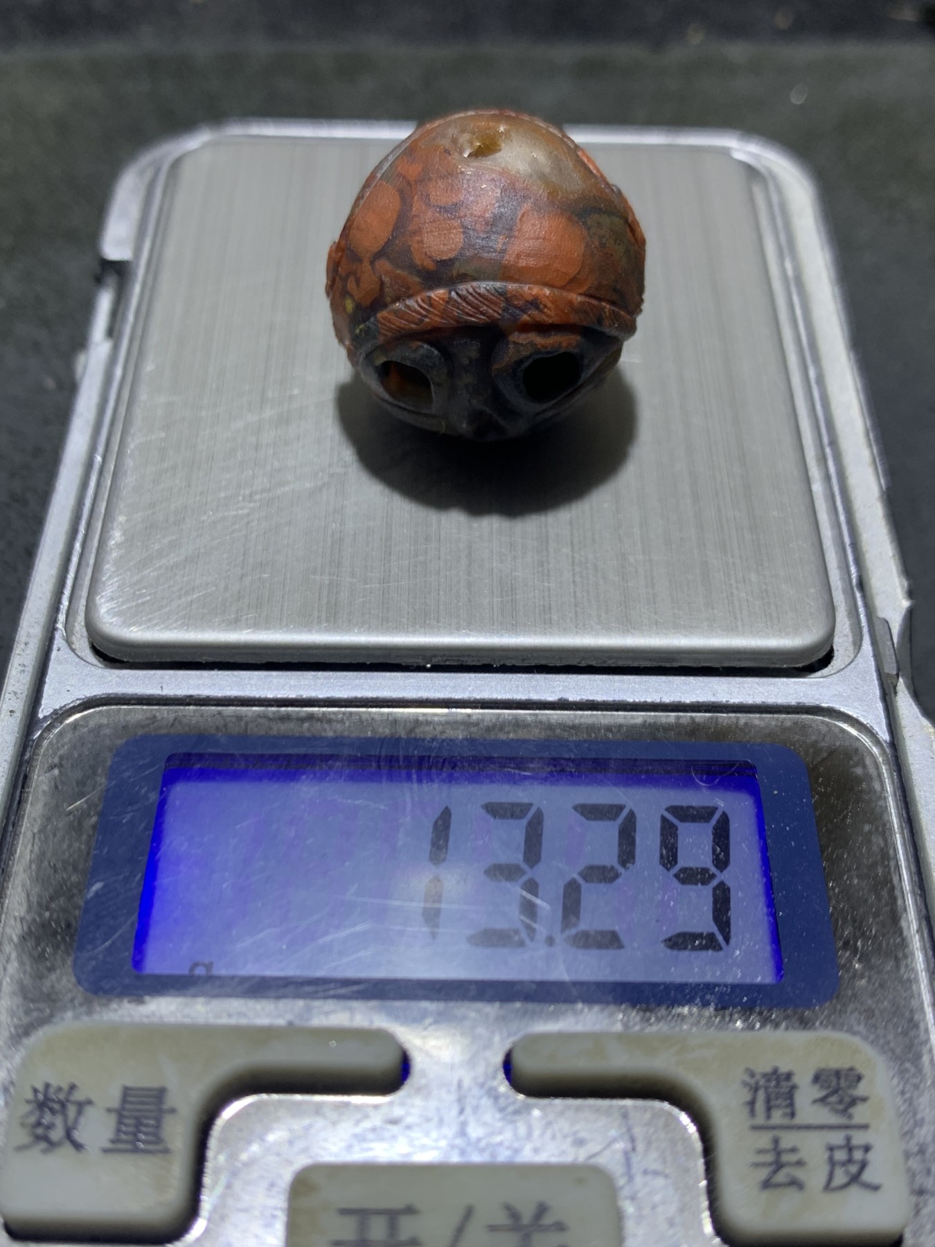 精美亚光高玉化战国红玛瑙手工雕刻骷髅船长圆珠一个！