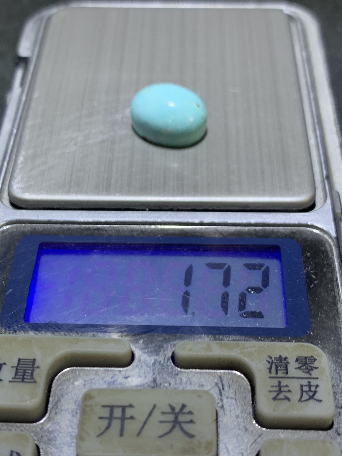 十堰原矿三无蓝白料网花绿松石戒面一颗，
