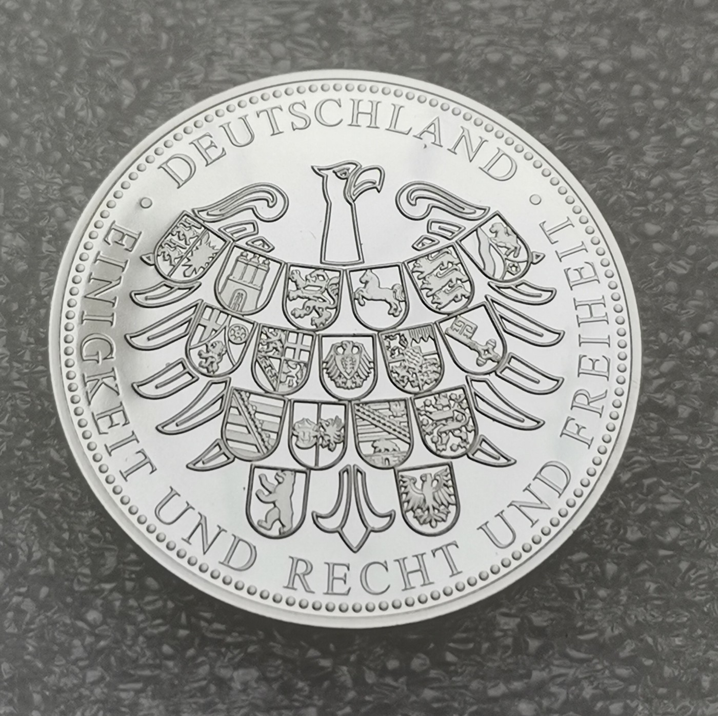 瓶子🏺第114期拍卖会  少见德国精制运动掷铁饼纪念银章