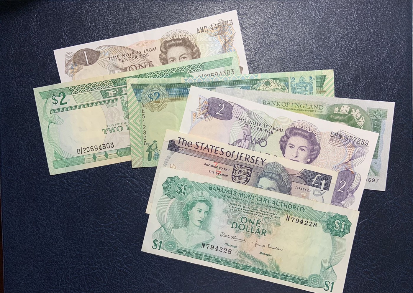 收藏联盟Quantum Auction 第298期拍卖  英国和英属，新西兰纸币7张 品相如图 英国1镑为UNC 新西兰和泽西岛为UNC-