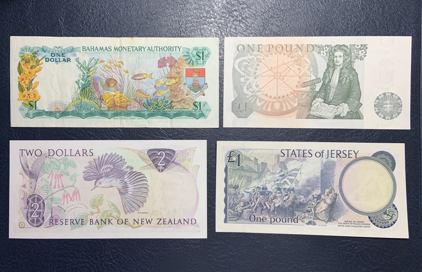 收藏联盟Quantum Auction 第298期拍卖  英国和英属，新西兰纸币7张 品相如图 英国1镑为UNC 新西兰和泽西岛为UNC-
