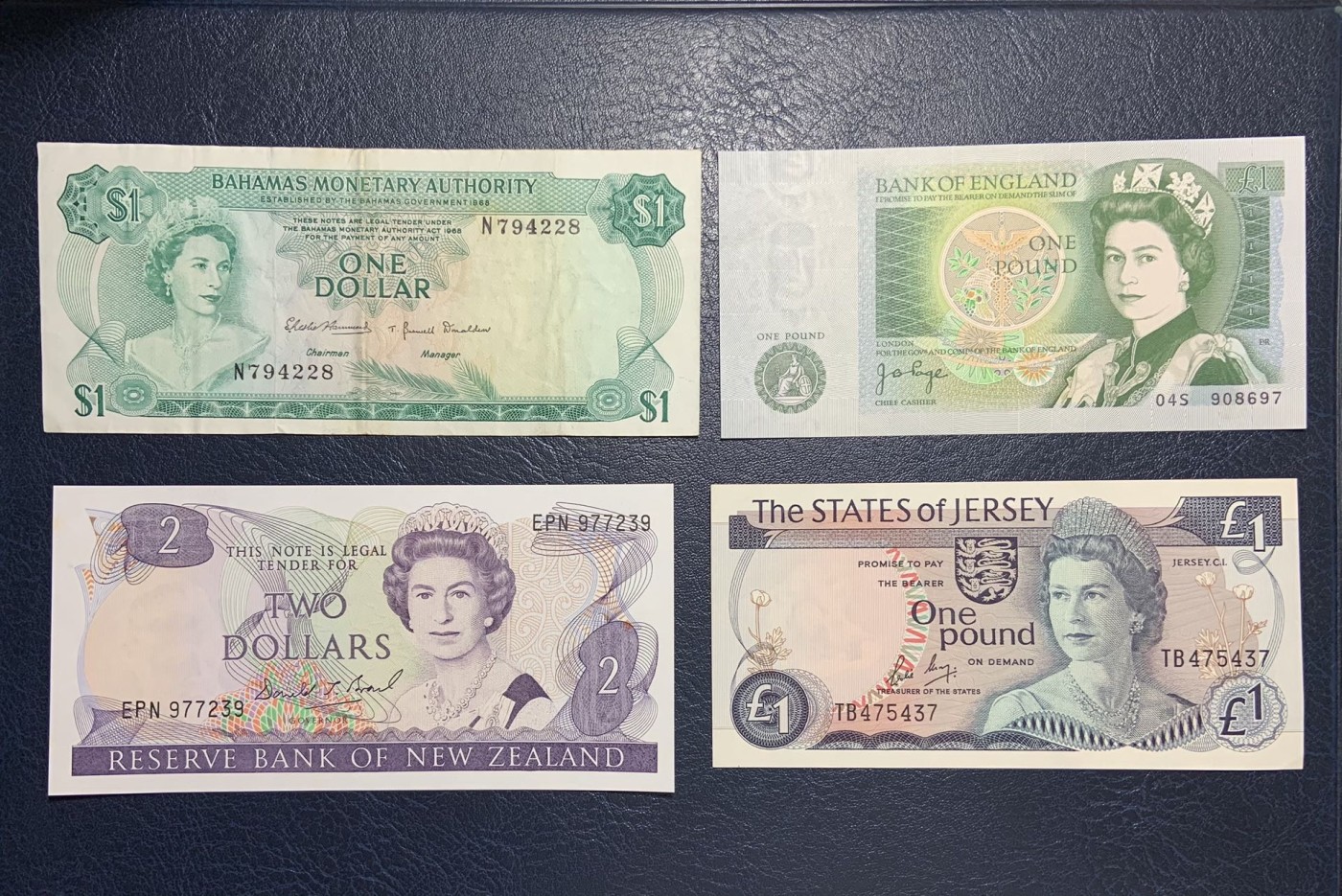 收藏联盟Quantum Auction 第298期拍卖  英国和英属，新西兰纸币7张 品相如图 英国1镑为UNC 新西兰和泽西岛为UNC-