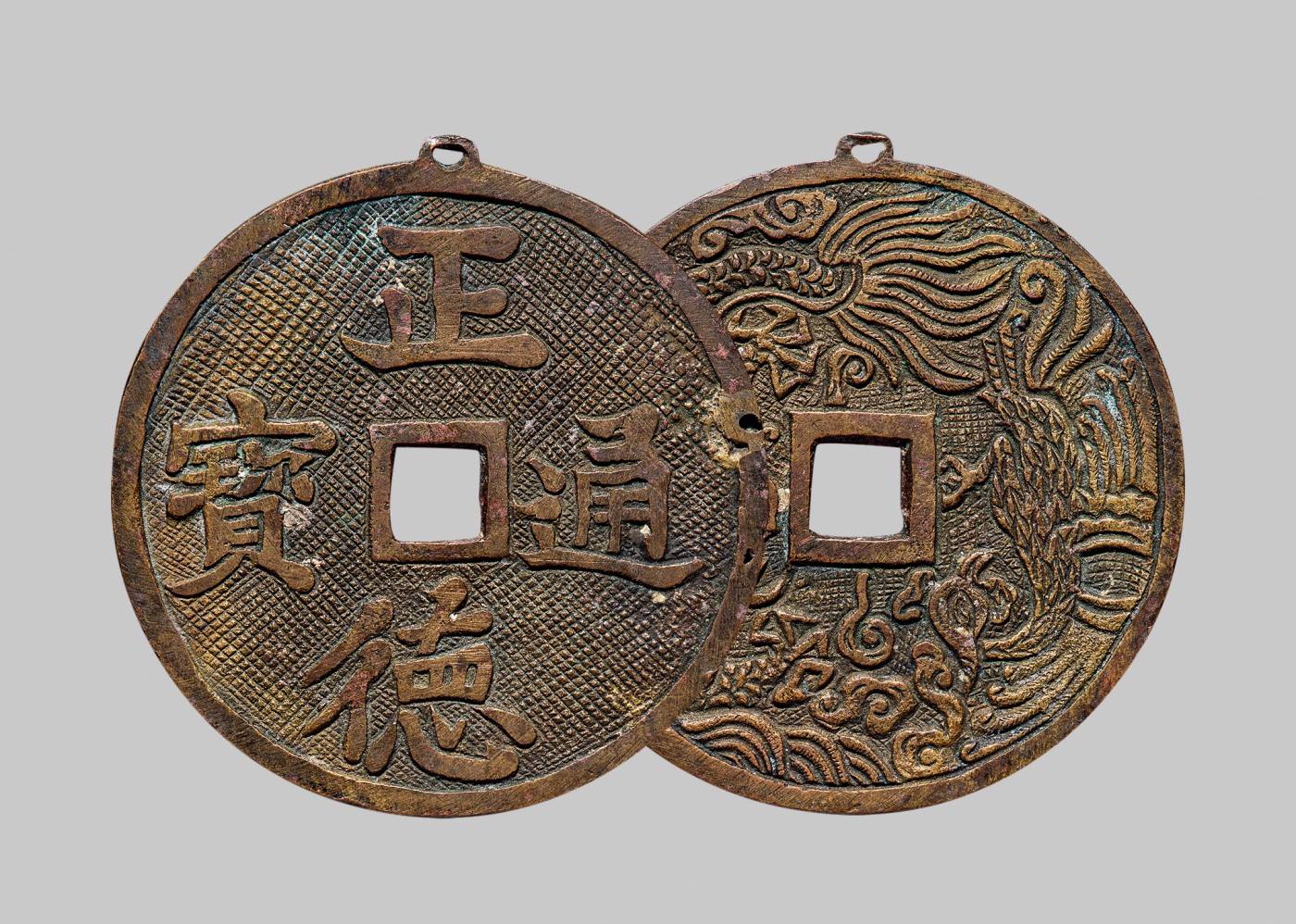 广州中孚2023年秋季拍卖会 清代 正德通宝 背龙凤 挂花 直径45.6mm*44.3mm*1.7mm 重13.9克