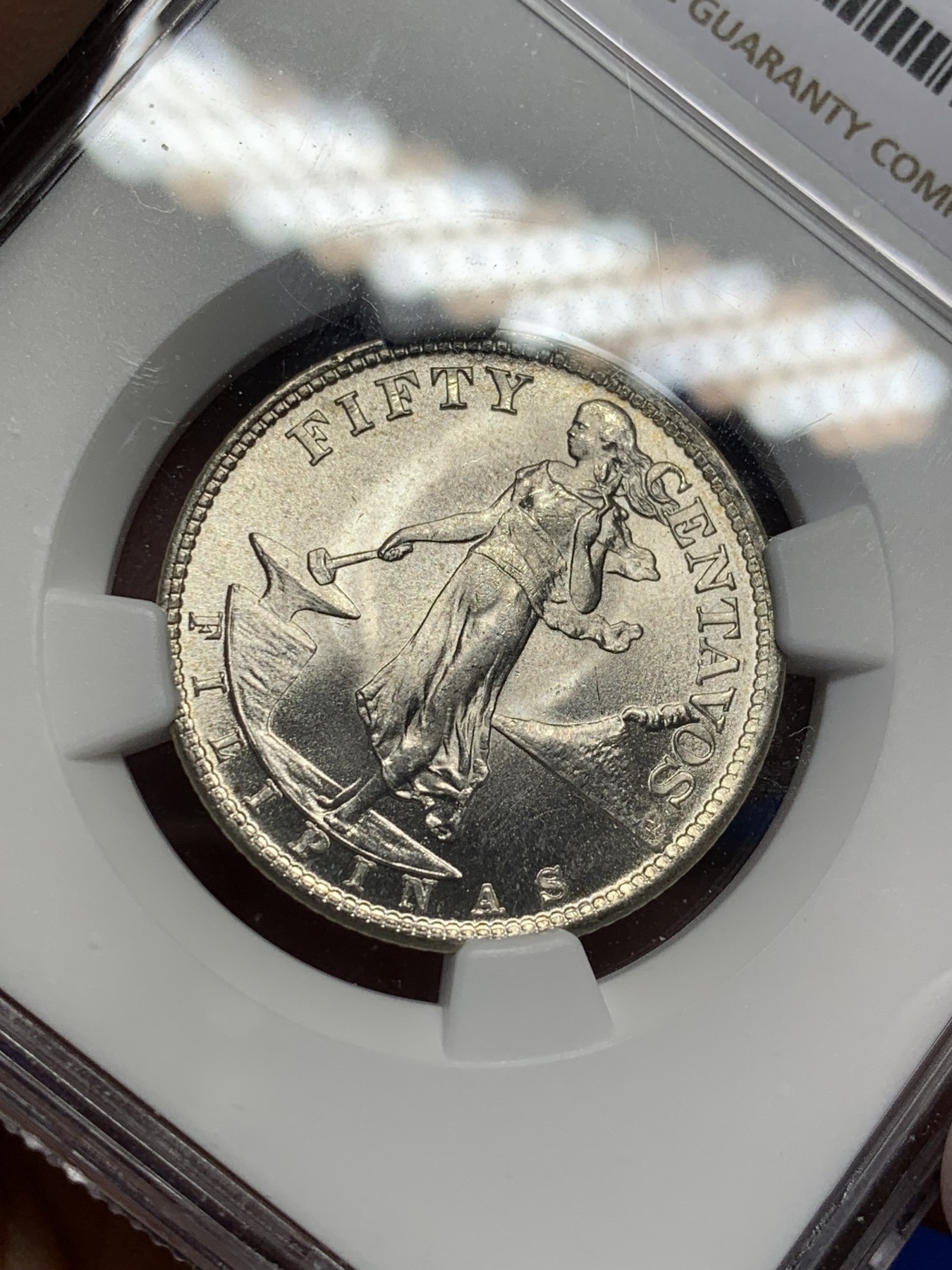 《竞宝斋》第208场-周日，周一 2场 (全场包邮) NGC MS64 美属菲律宾1945打铁女神50分银币 转光强烈