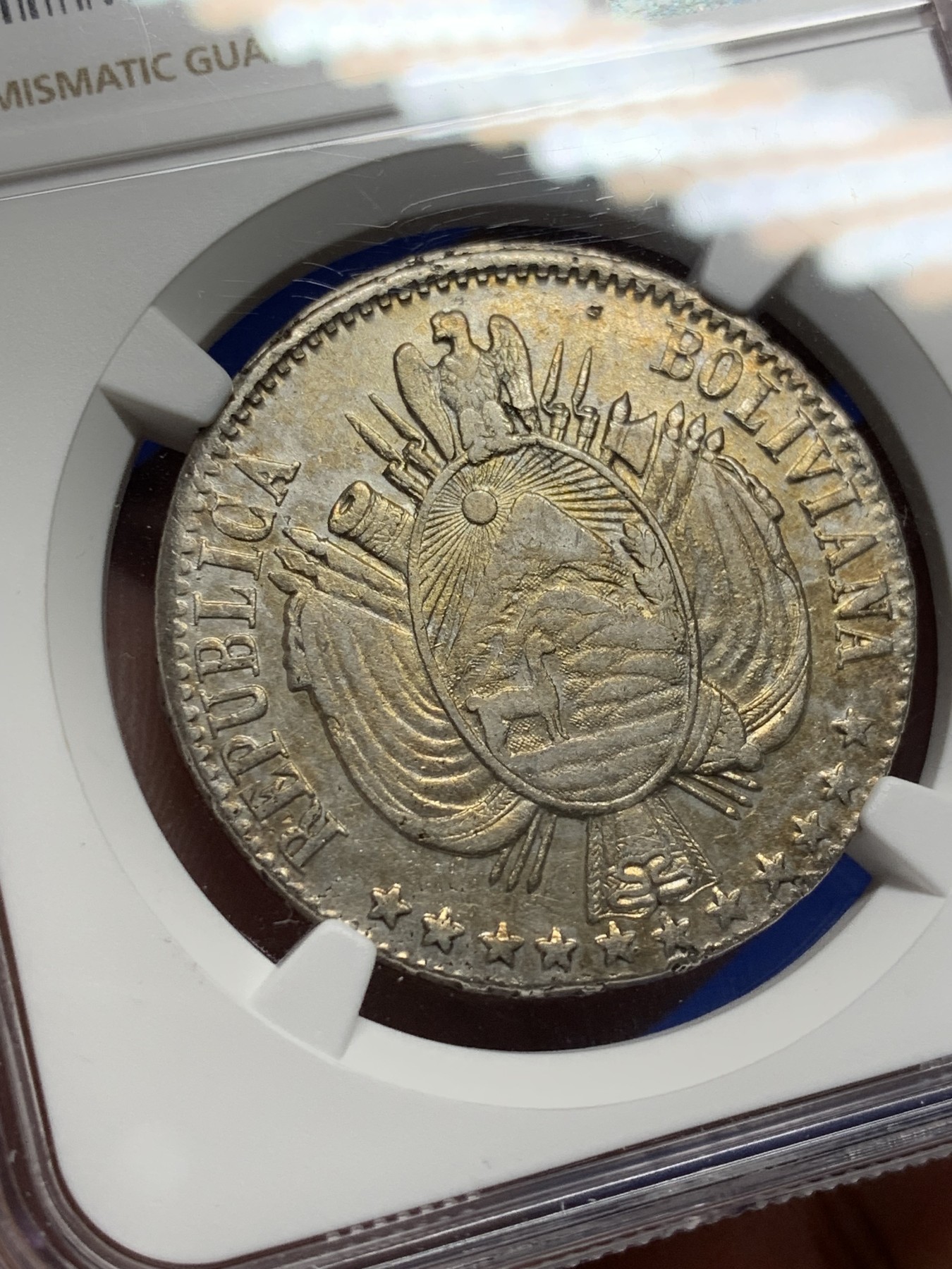 《竞宝斋》第208场-周日，周一 2场 (全场包邮) NGC  AUD 1868玻利维亚1玻利瓦尔银币 少见的11星版 淡金色包浆