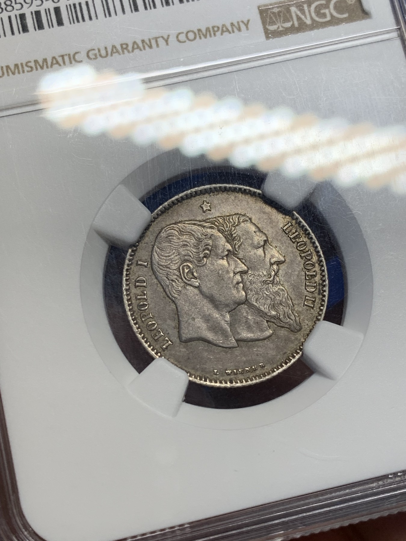 《竞宝斋》第208场-周日，周一 2场 (全场包邮) NGC MS62 比利时1880年建国50周年纪念1法郎银币，数量较少