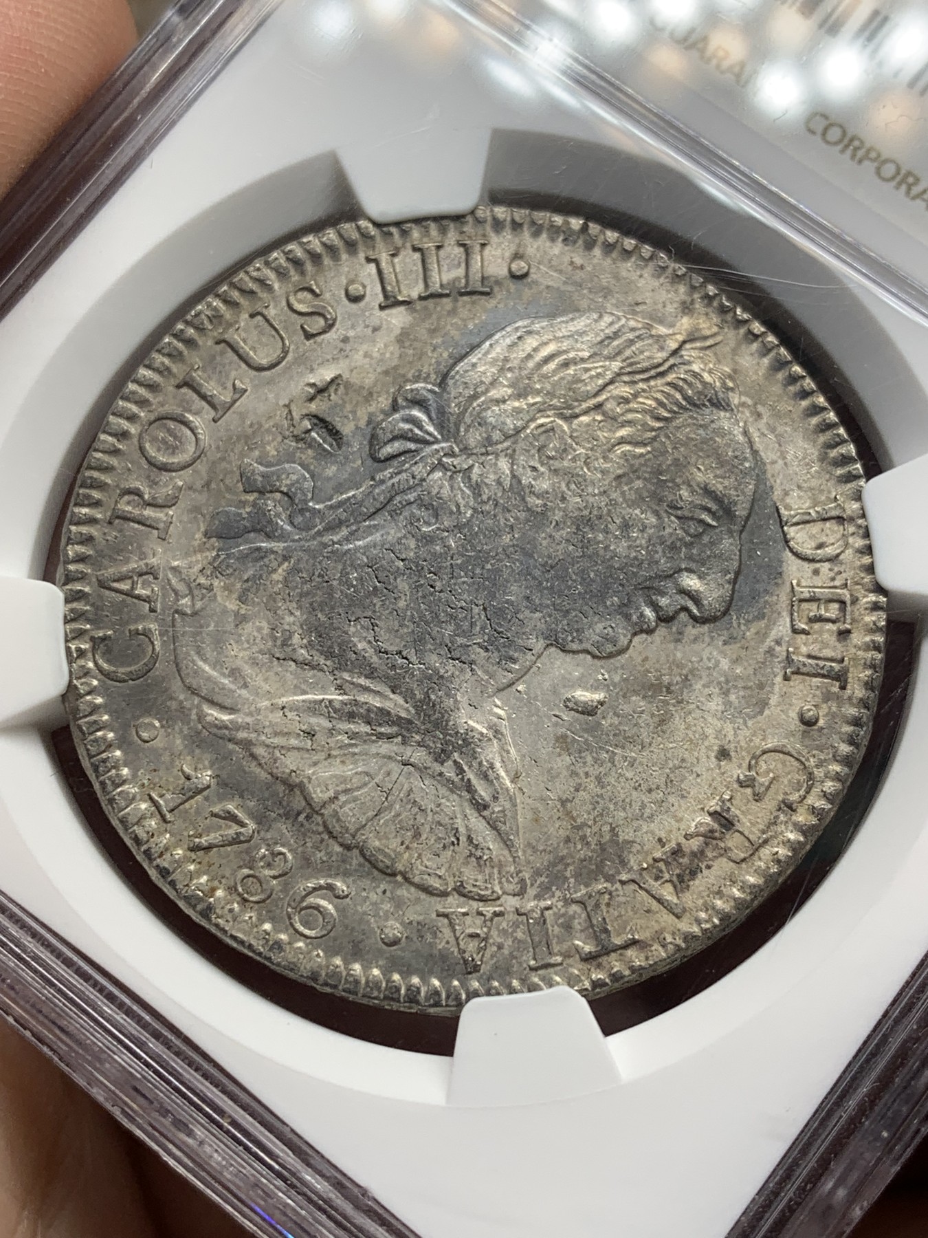 《竞宝斋》第208场-周日，周一 2场 (全场包邮) NGC AU 墨西哥1786MO 卡三8R双柱大银币 有小戳 整体深打 不错