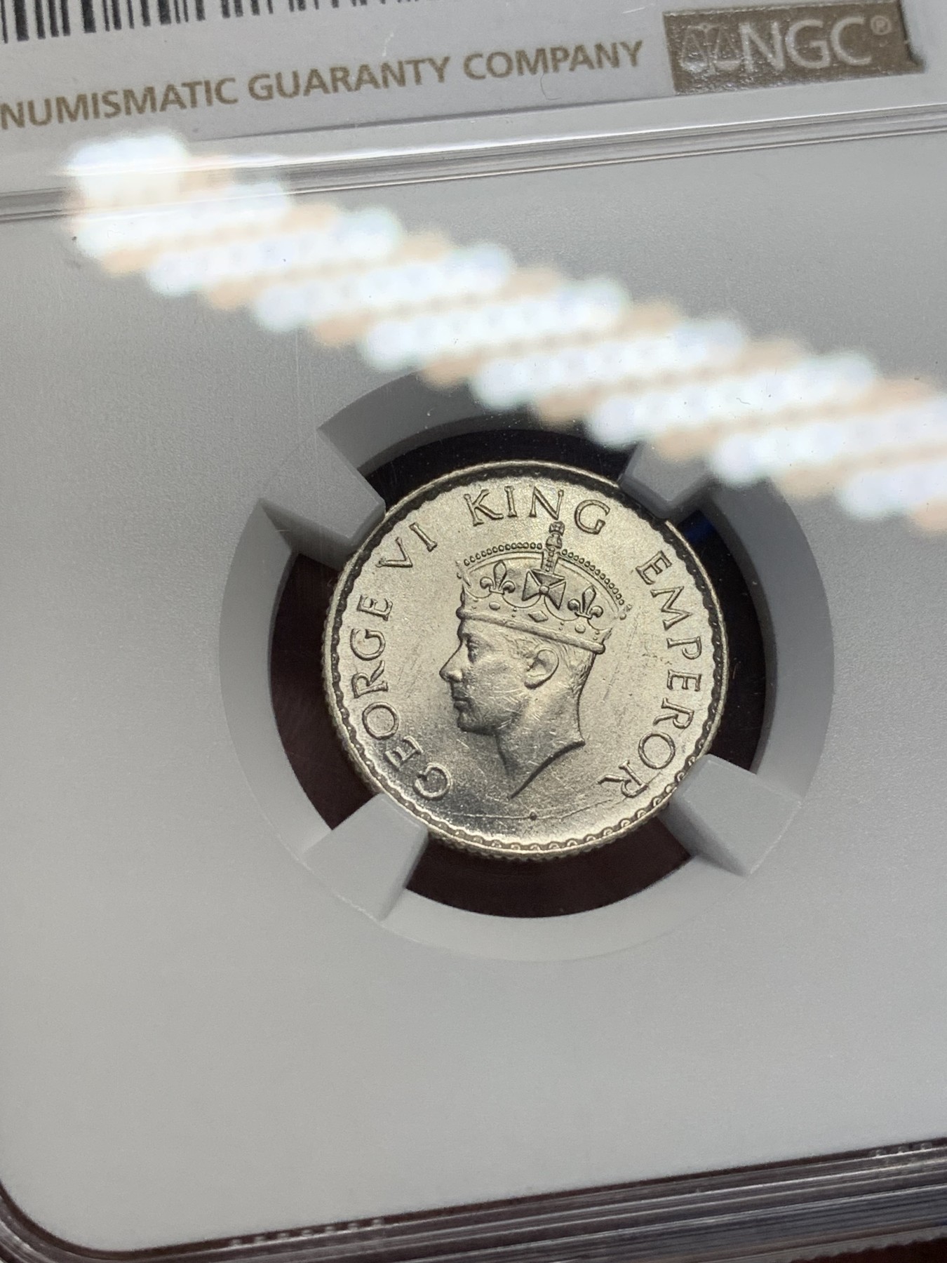 《竞宝斋》第208场-周日，周一 2场 (全场包邮) NGC MS63 英属印度 1940 乔六 1/4卢比银币 大面值常见 1/4的 流通大好品不容易