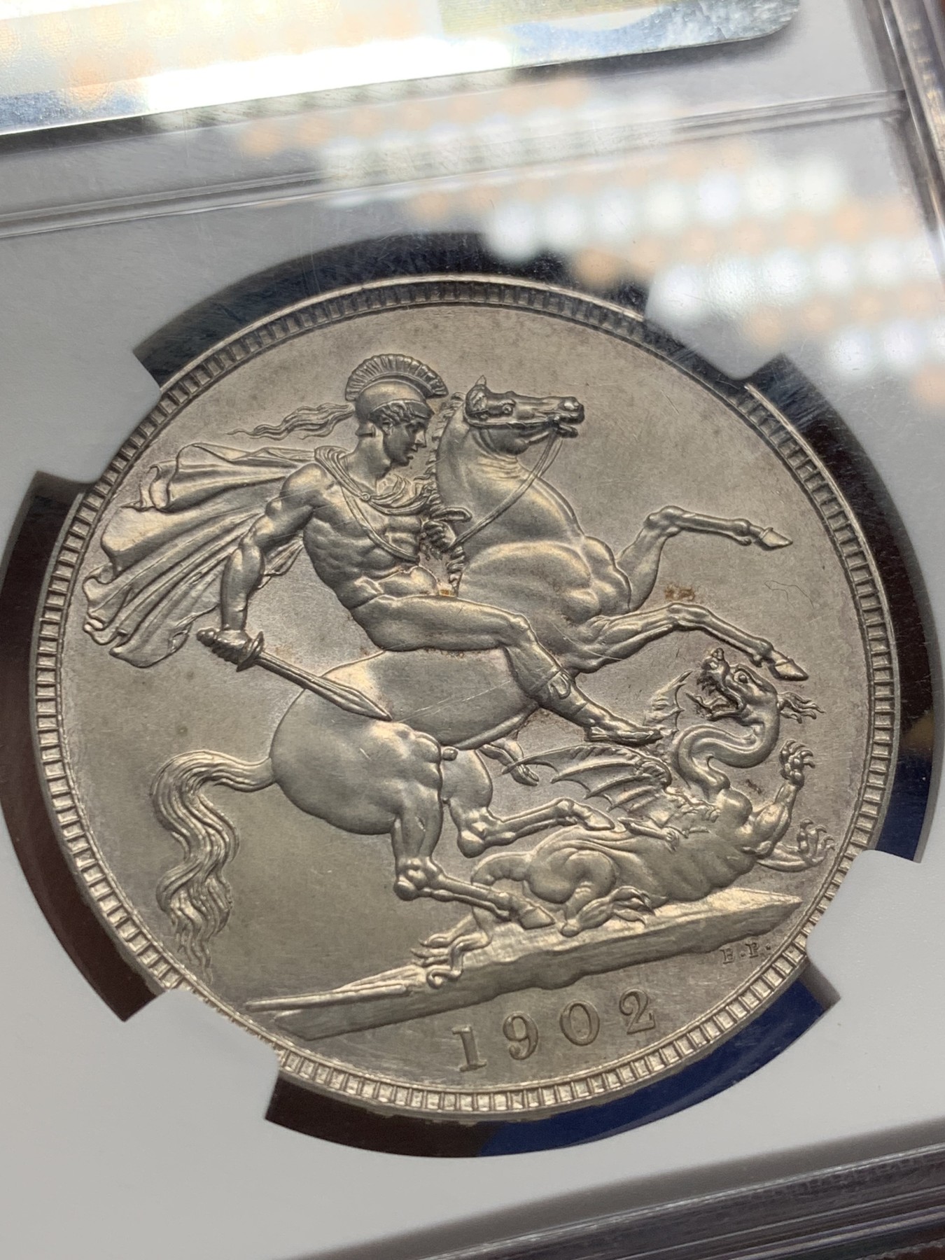 《竞宝斋》第209场-周日，周一 2场 (全场包邮) NGC PF62 英国1902年爱七马剑银币，好味道带彩，非常漂亮的一枚，2023年10月前几天刚拍的带佣金4200品相不如这枚。