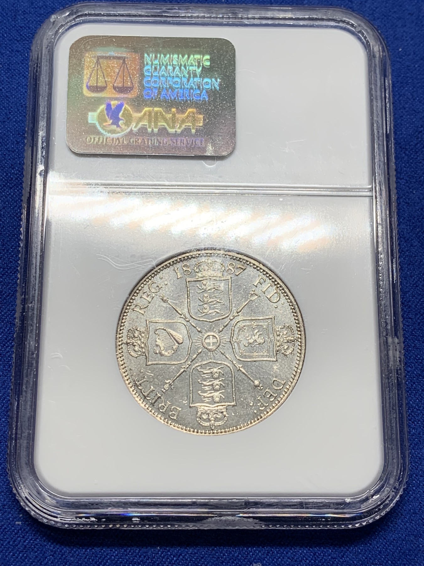 《竞宝斋》第209场-周日，周一 2场 (全场包邮) NGC-MS63PL 1887年 英国 维多利亚女王 2先令 大银币   少见的NGC认证的PL镜面初铸精制底板，老盒严评，能评上PL的屈指可数，季军，更高分仅1枚