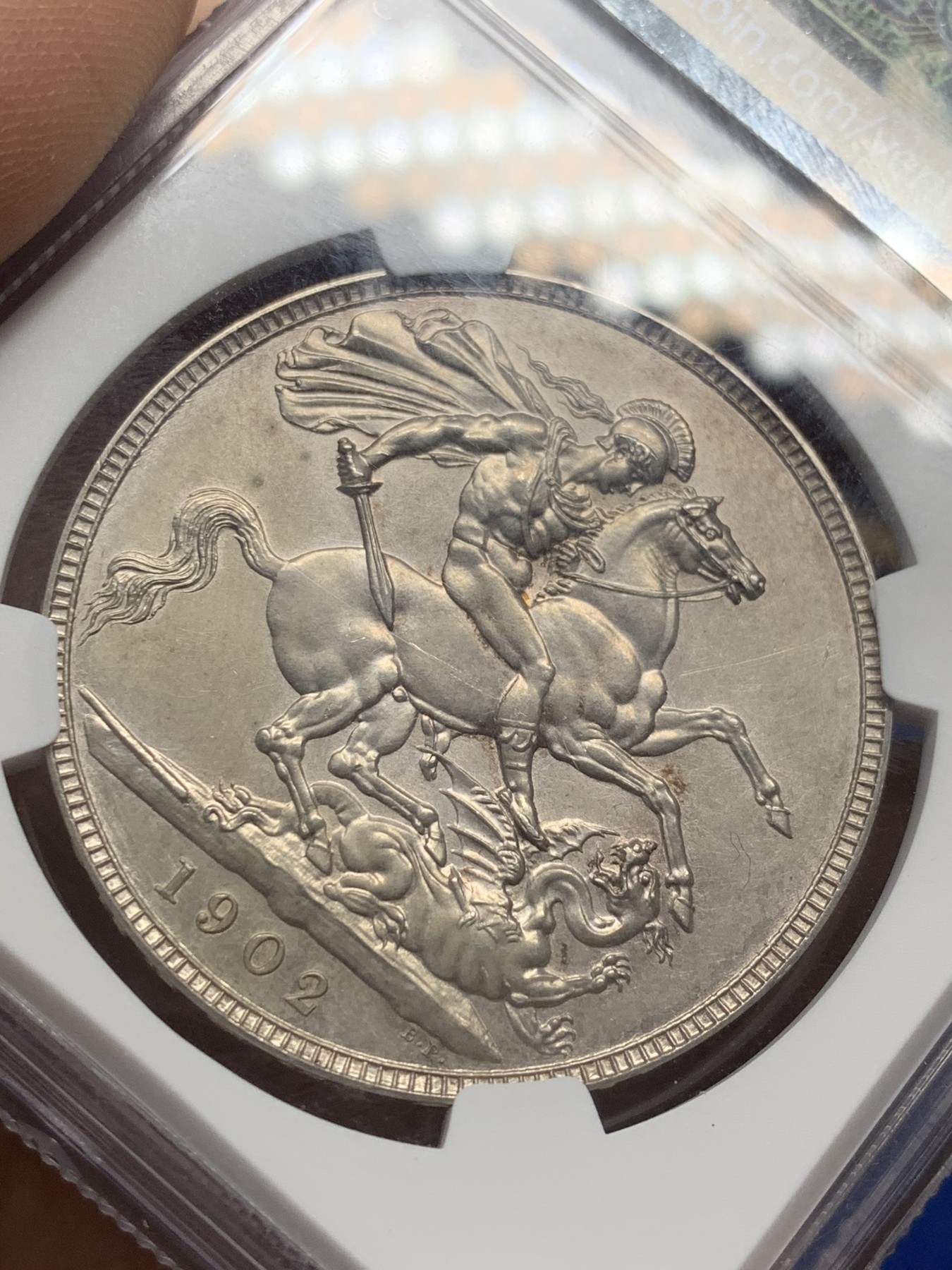 《竞宝斋》第209场-周日，周一 2场 (全场包邮) NGC PF62 英国1902年爱七马剑银币，好味道带彩，非常漂亮的一枚，2023年10月前几天刚拍的带佣金4200品相不如这枚。