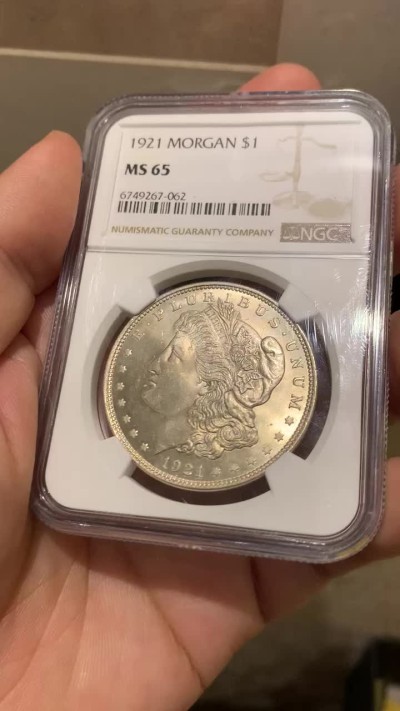 《竞宝斋》第209场-周日，周一 2场 (全场包邮) NGC MS65 美国1921年摩根1元银币，65分是分水岭，出65非常不容易。