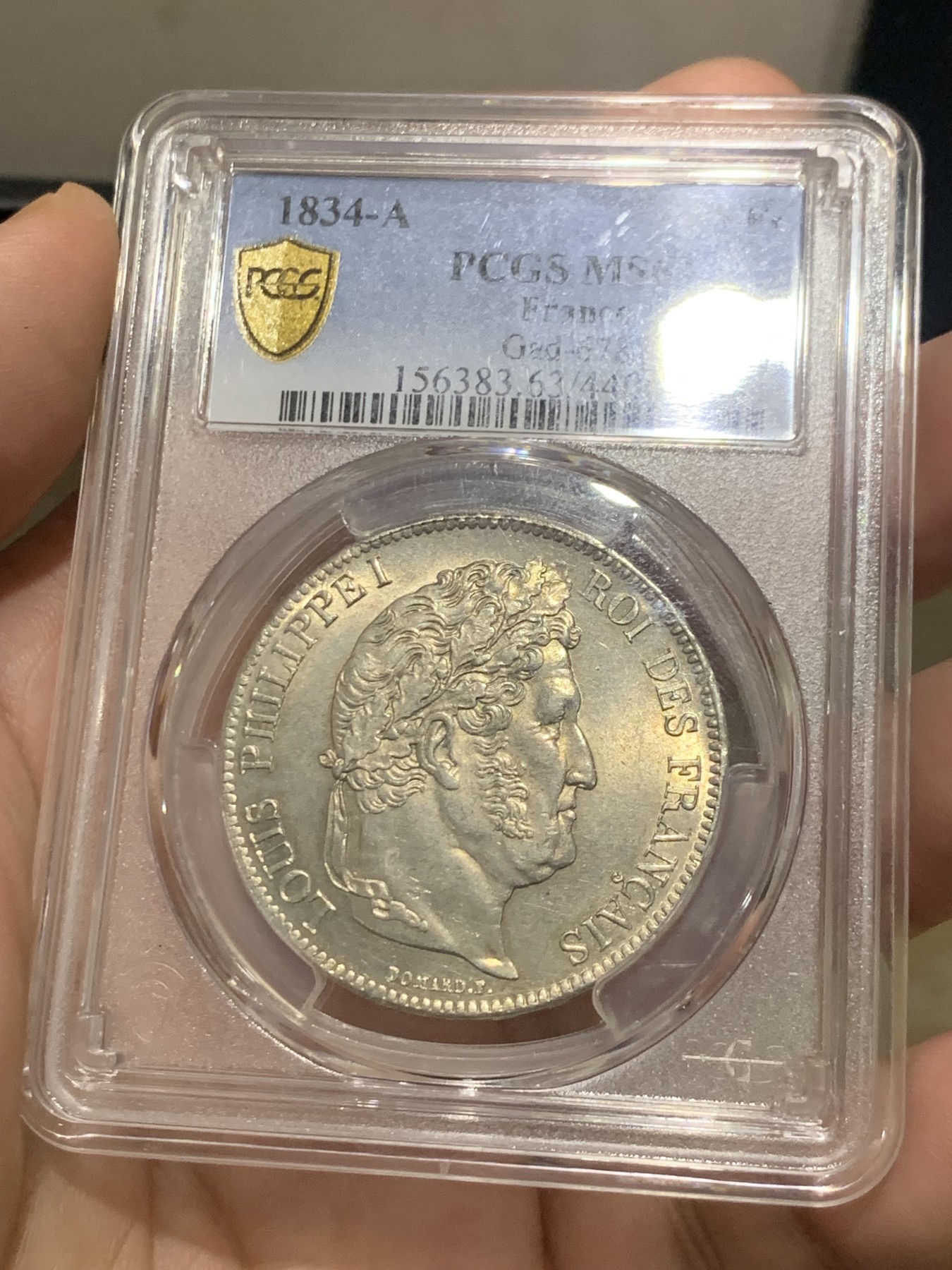 《竞宝斋》第209场-周日，周一 2场 (全场包邮) PCGS MS63 法国1834菲利普一世5法郎银币，淡黄包浆 丝绸底板，少见年份 冠军分也是广告封面币。