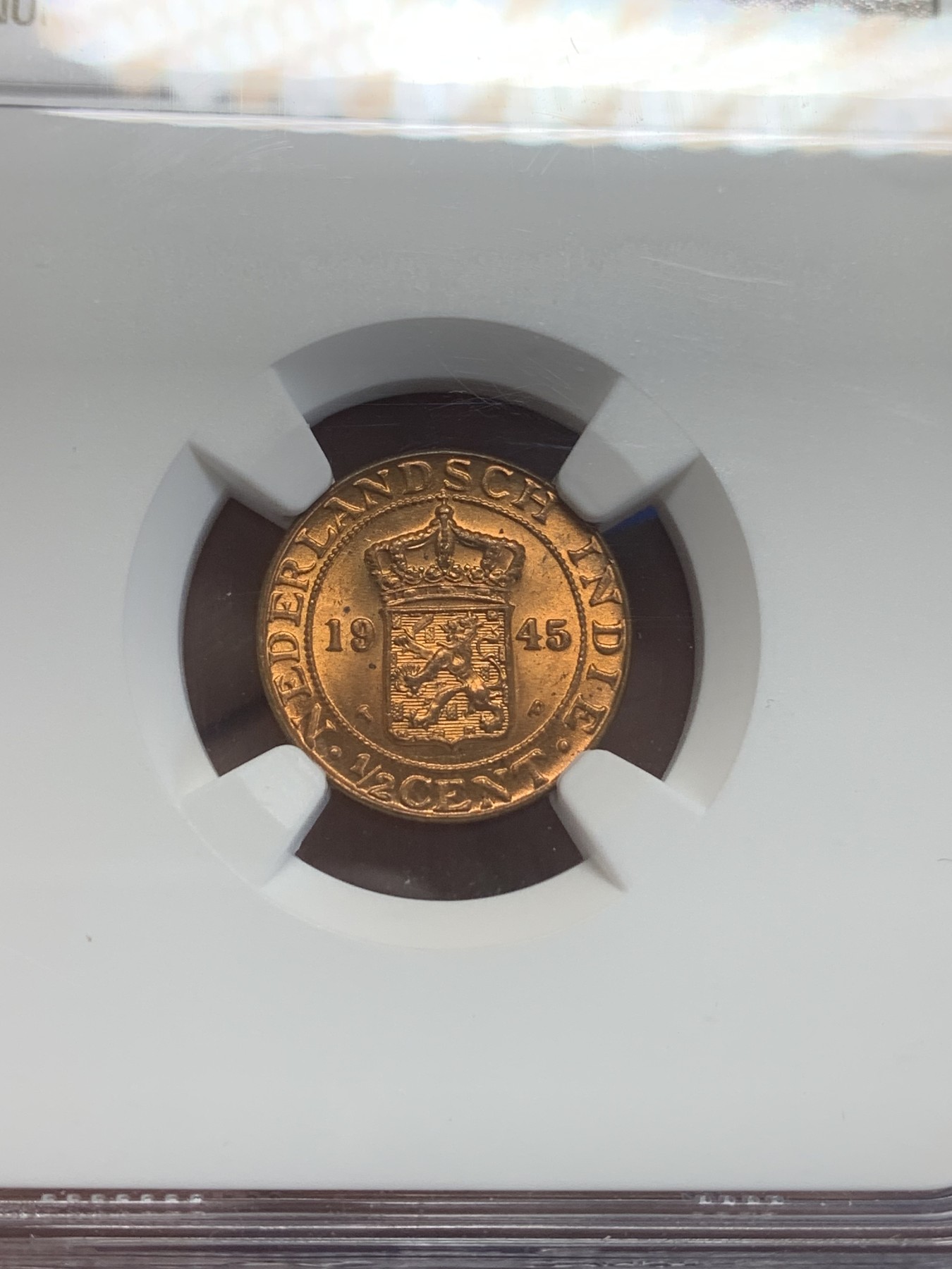 《竞宝斋》第209场-周日，周一 2场 (全场包邮) NGC-MS65RB 荷属东印度 1945年半分铜币 高分好状态