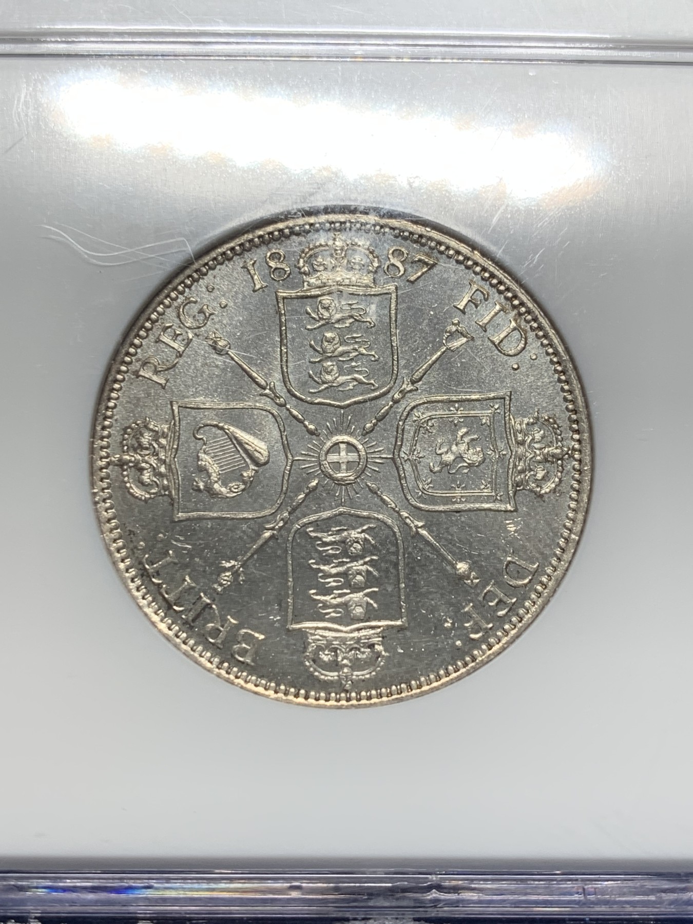 《竞宝斋》第209场-周日，周一 2场 (全场包邮) NGC-MS63PL 1887年 英国 维多利亚女王 2先令 大银币   少见的NGC认证的PL镜面初铸精制底板，老盒严评，能评上PL的屈指可数，季军，更高分仅1枚