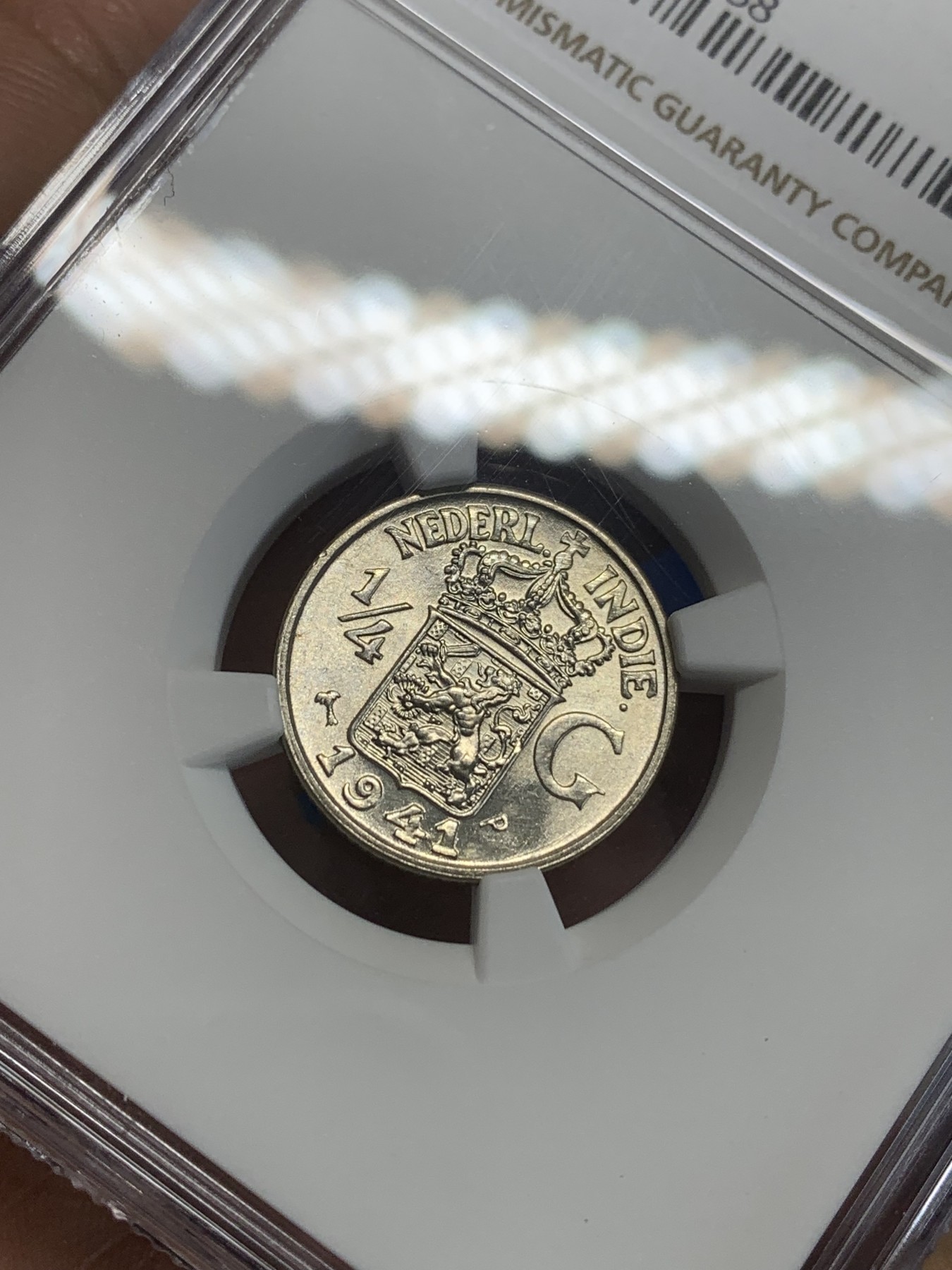 《竞宝斋》第209场-周日，周一 2场 (全场包邮) NGC-MS65 荷属东印度 1941-P年 1/4盾 银币 顶级品相 可以收藏