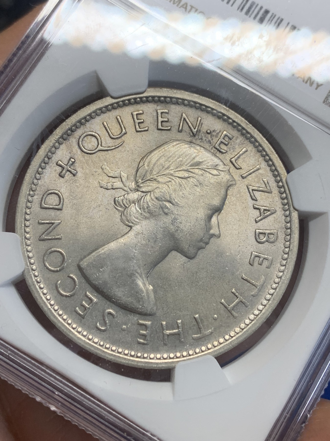 《竞宝斋》第209场-周日，周一 2场 (全场包邮) NGC MS64 南罗德西亚（津巴布韦）1953年纪念罗德斯诞辰一百周年一克朗大银币 全新转光