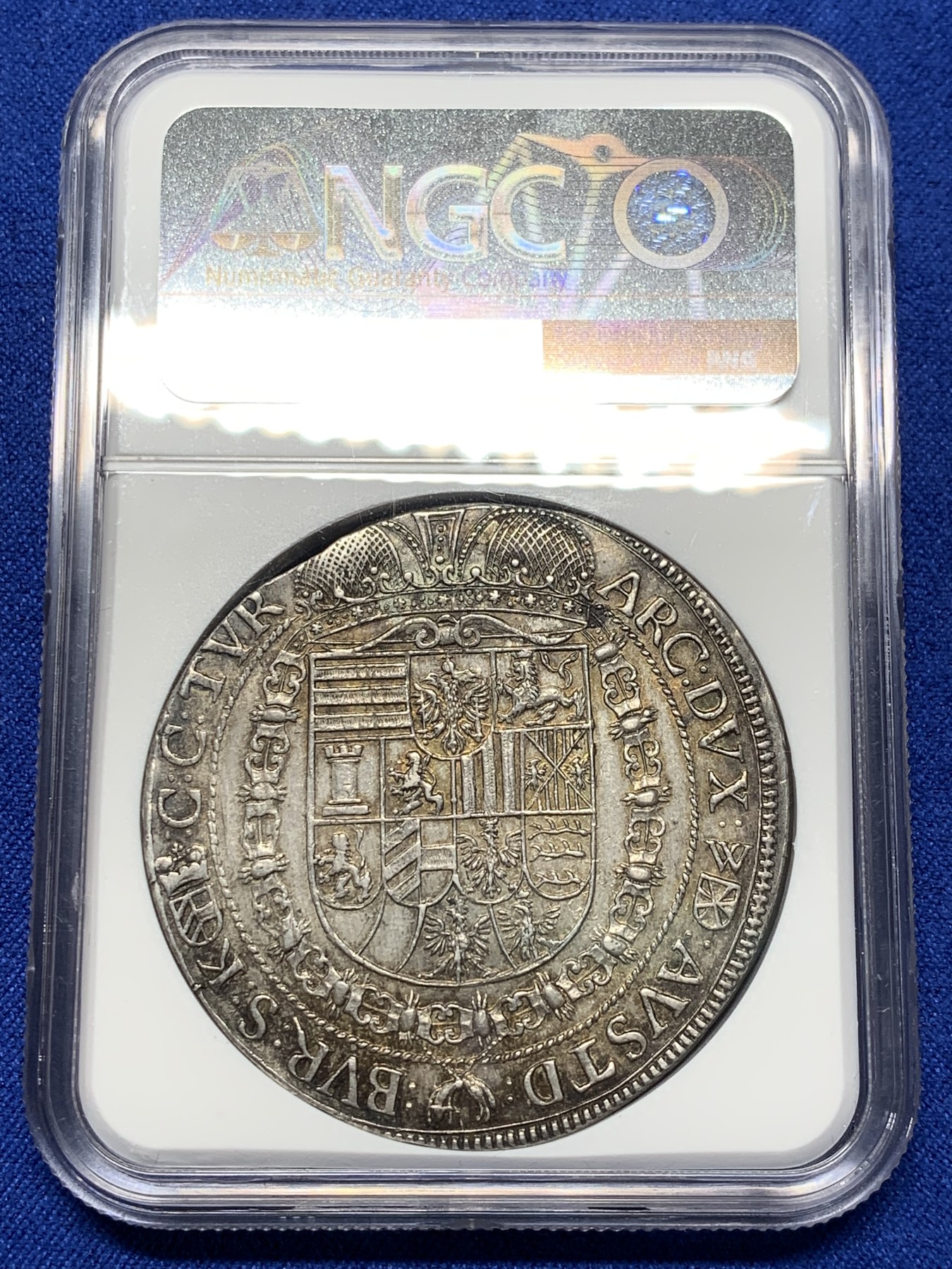 《竞宝斋》第209场-周日，周一 2场 (全场包邮) NGC-AU58 1652年 神圣罗马帝国 斐迪南三世 1泰勒 大银币   原光黄金包浆，高点俱在细节佳，低评，该年份冠军分！维也纳造币厂，少见品种，猪嘴利奥波德一世的爸爸