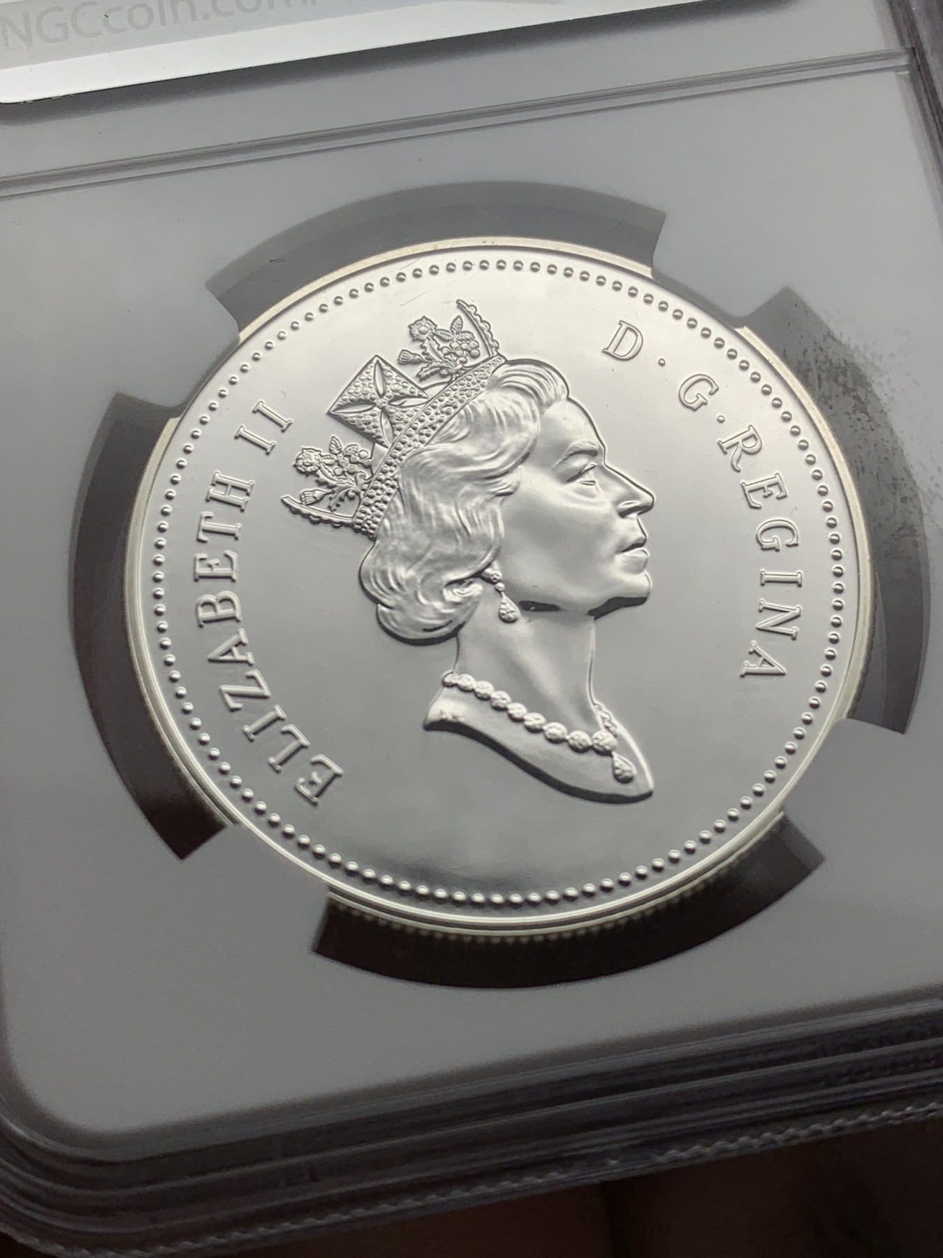 《竞宝斋》第209场-周日，周一 2场 (全场包邮) NGC MS69 DPL 加拿大1990年探险1元银币