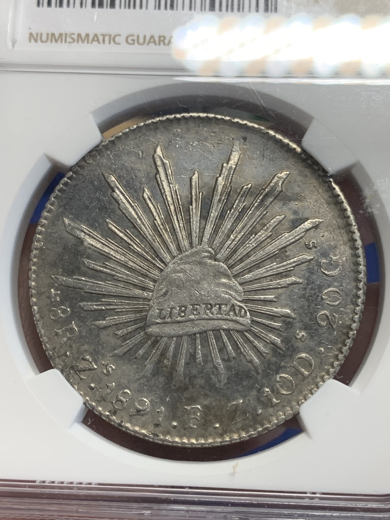 《竞宝斋》第209场-周日，周一 2场 (全场包邮) NGC AU 墨西哥1891年8R全羽毛鹰洋银币 漆黑古包浆 砸盒币重评可能有惊喜