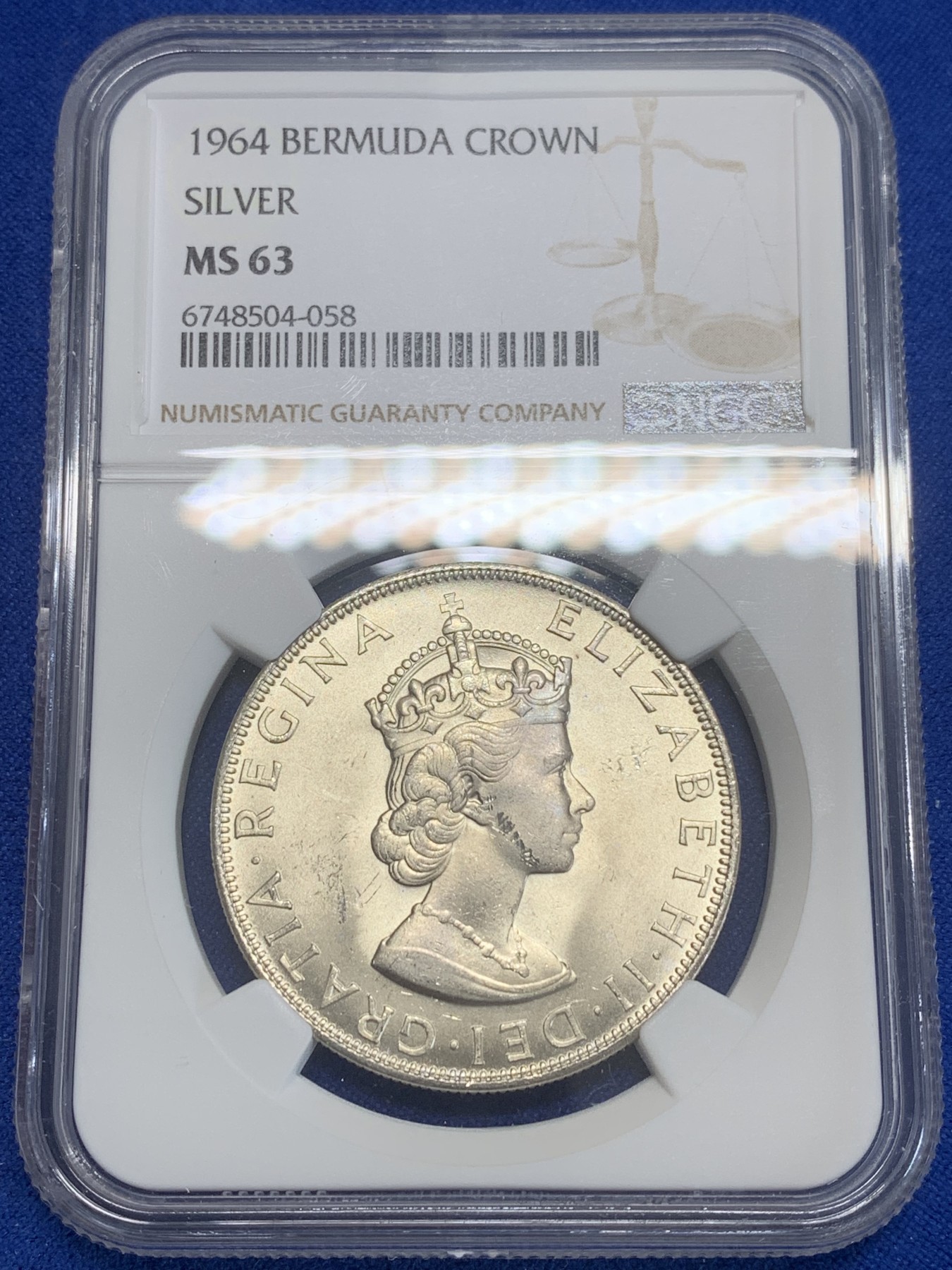 《竞宝斋》第209场-周日，周一 2场 (全场包邮) NGC-MS63 英属百慕大群岛1964年一克朗银币 经典女皇头像 十分漂亮