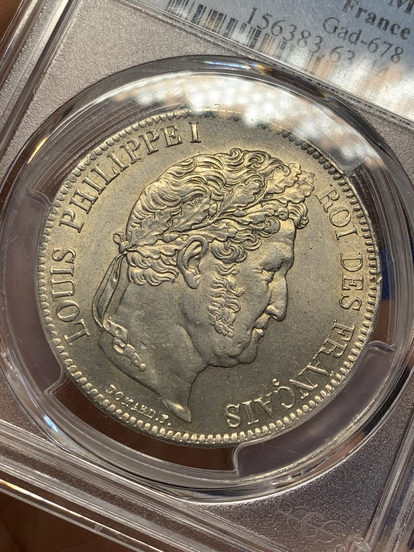 《竞宝斋》第209场-周日，周一 2场 (全场包邮) PCGS MS63 法国1834菲利普一世5法郎银币，淡黄包浆 丝绸底板，少见年份 冠军分也是广告封面币。