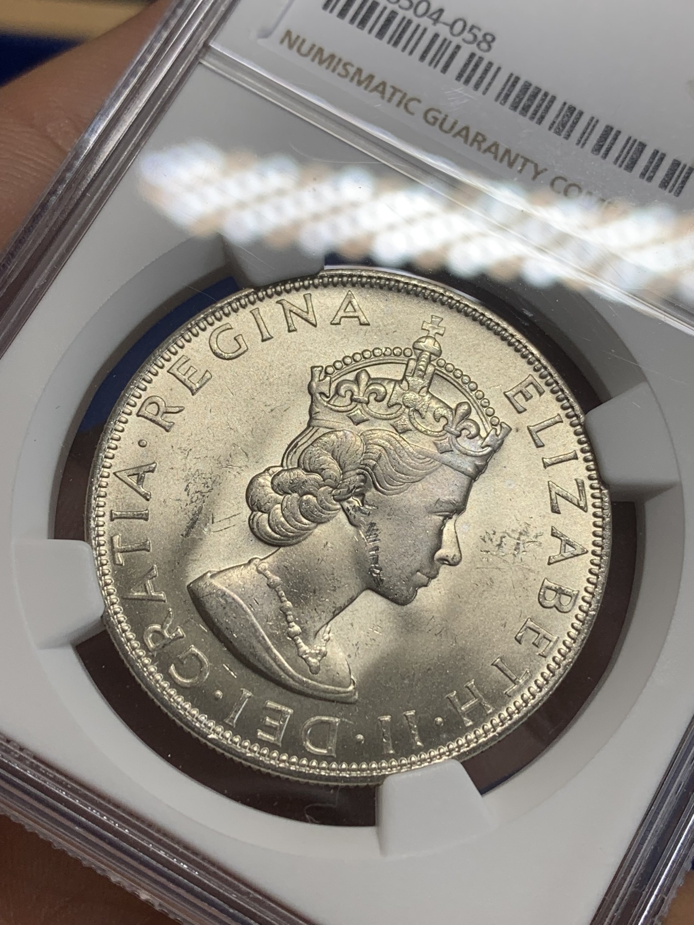 《竞宝斋》第209场-周日，周一 2场 (全场包邮) NGC-MS63 英属百慕大群岛1964年一克朗银币 经典女皇头像 十分漂亮