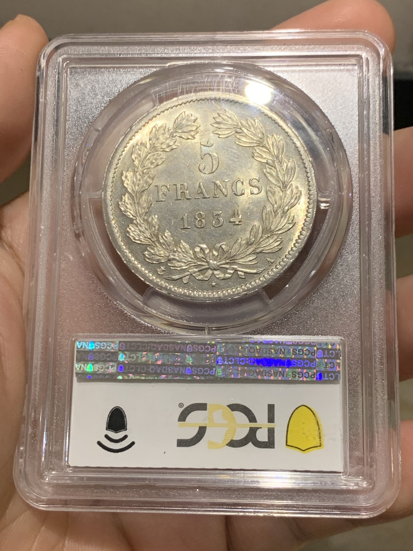 《竞宝斋》第209场-周日，周一 2场 (全场包邮) PCGS MS63 法国1834菲利普一世5法郎银币，淡黄包浆 丝绸底板，少见年份 冠军分也是广告封面币。