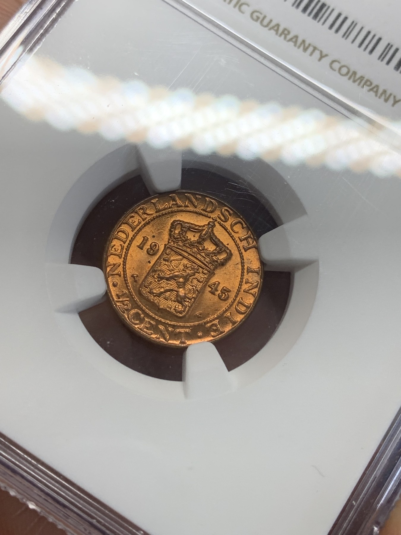 《竞宝斋》第209场-周日，周一 2场 (全场包邮) NGC-MS65RB 荷属东印度 1945年半分铜币 高分好状态