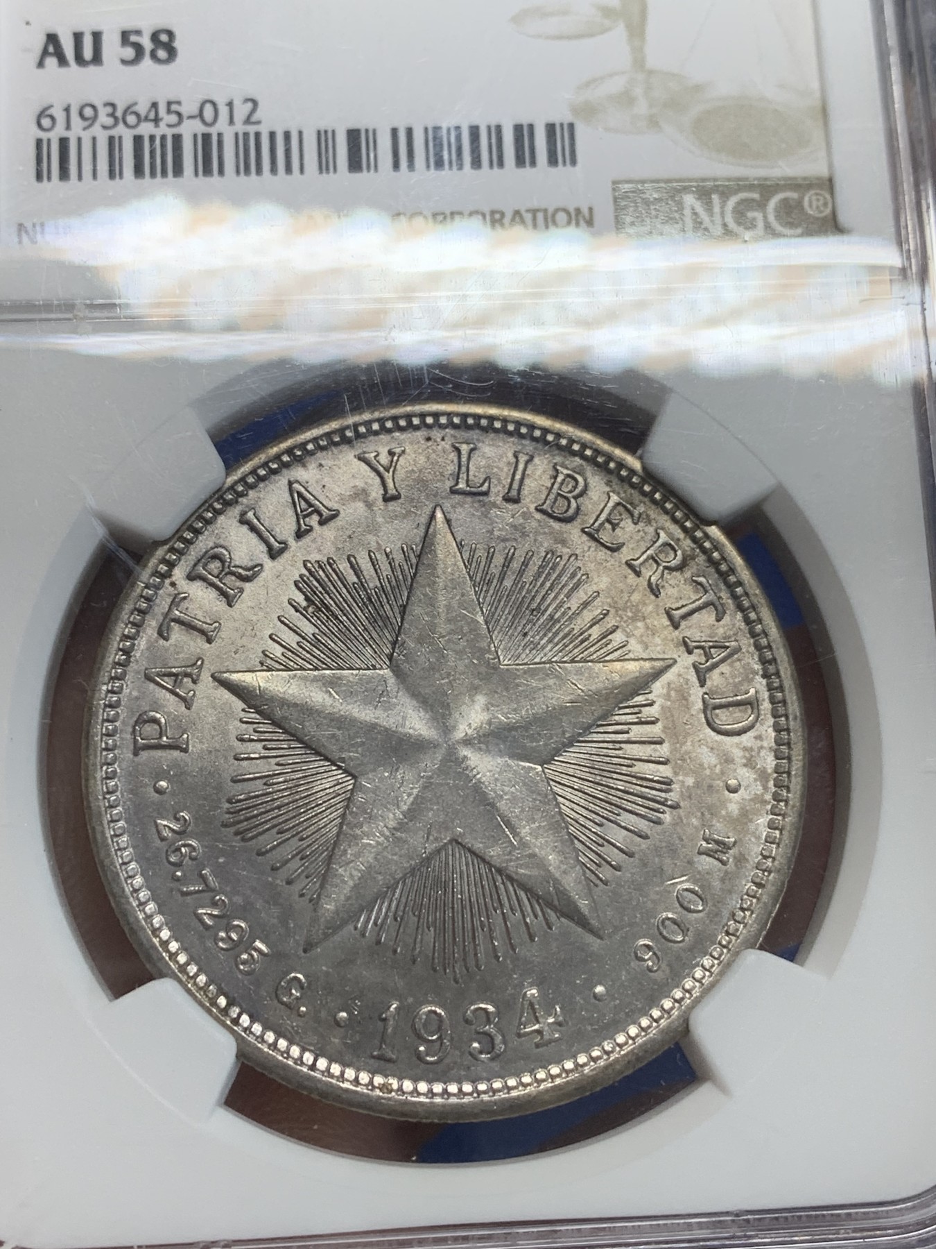 《竞宝斋》第209场-周日，周一 2场 (全场包邮) NGC-AU58 古巴 1934年 star type 大五星1比索 银币