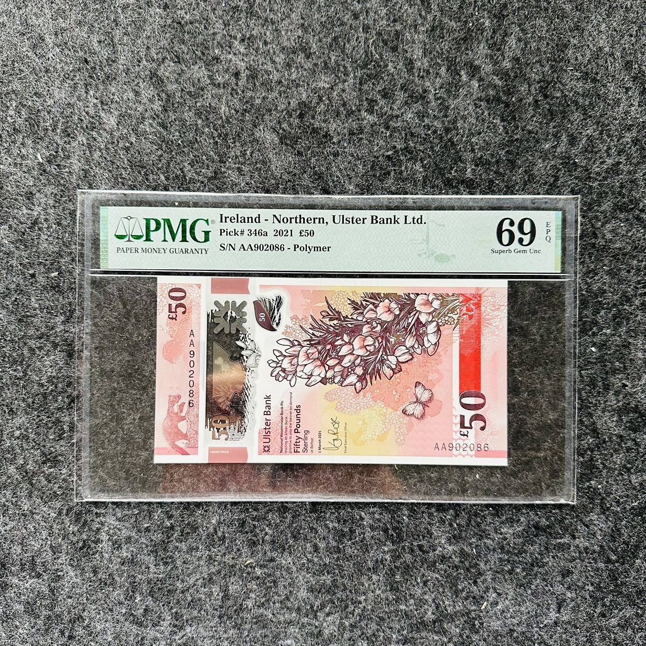 北爱阿尔斯特银行2022年50镑塑料钞，AA首发冠，无47，PMG69