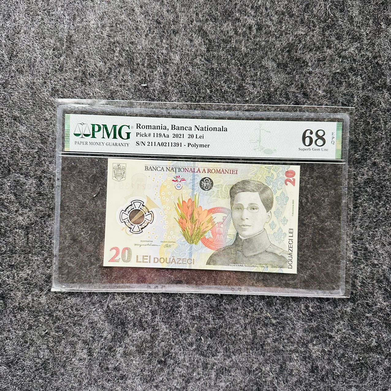 罗马尼亚2021年20列伊塑料钞，211A首发冠，PMG68