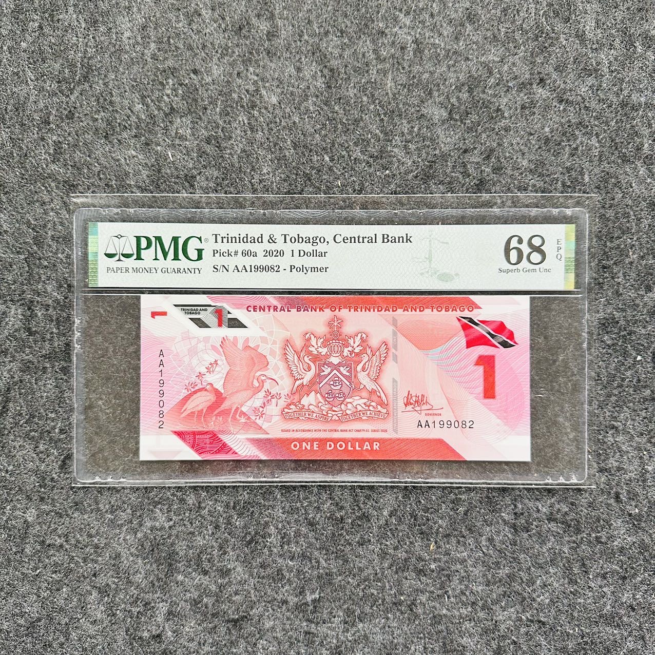 特立尼达和多巴哥2021年1元塑料钞，AA首发冠，PMG68