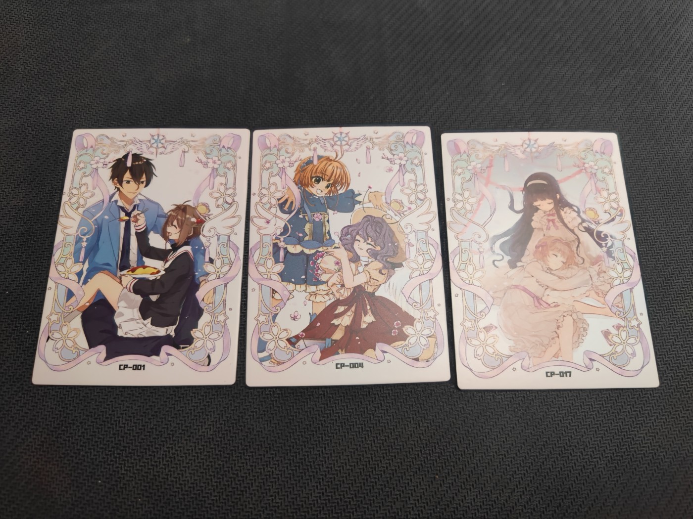 妖精的尾巴卡牌拍卖第四场 魔法少女樱cp卡三张