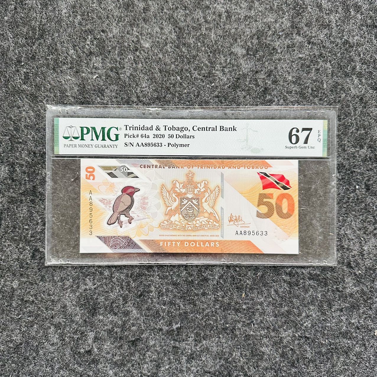 特立尼达和多巴哥2021年50元塑料钞，AA首发冠，PMG67