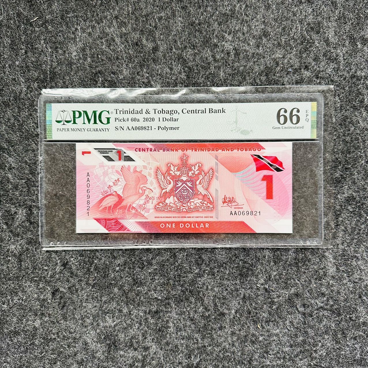 特立尼达和多巴哥2021年1元塑料钞，AA首发冠，PMG66