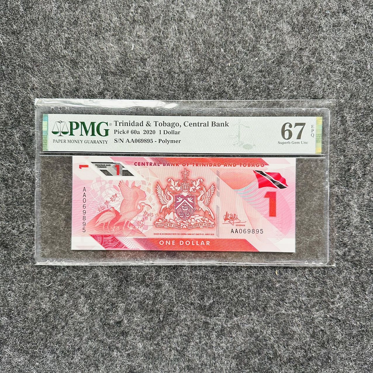 特立尼达和多巴哥2021年1元塑料钞，AA首发冠，PMG67