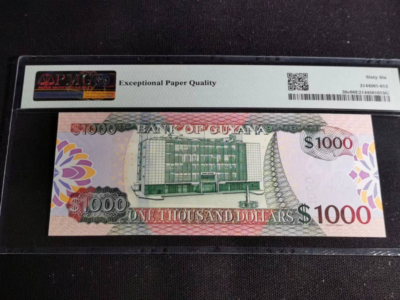 刘世昌艺术品销售中心～虎踞龙蟠*金杨在线联拍群第505期 圭亚那2019年1000元（PMG  66E   号码：BT285339）1枚。