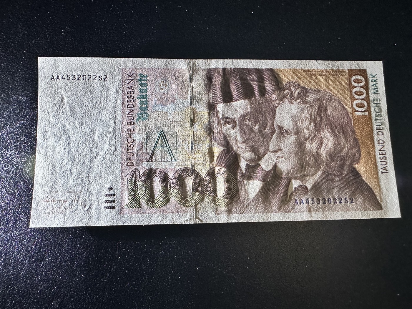 《外钞收藏家》第三百三十期 1991年德国1000马克 格林兄弟 AA冠 全新 基本没问题 中间有点安全压痕少许漏墨