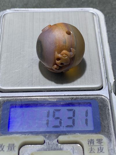 精美亚光高玉化巴西玛瑙手工俏色巧雕仿古龙随形圆珠一个！ 精美亚光高玉化巴西玛瑙手工俏色巧雕仿古龙随形圆珠一个！