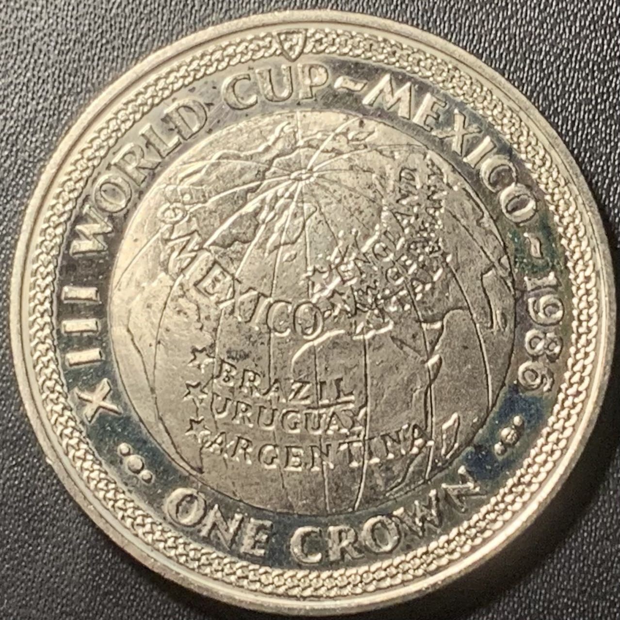 紫瑗钱币——第324期拍卖 马恩岛 1986年 墨西哥世界杯 地球村 1克朗 镍币