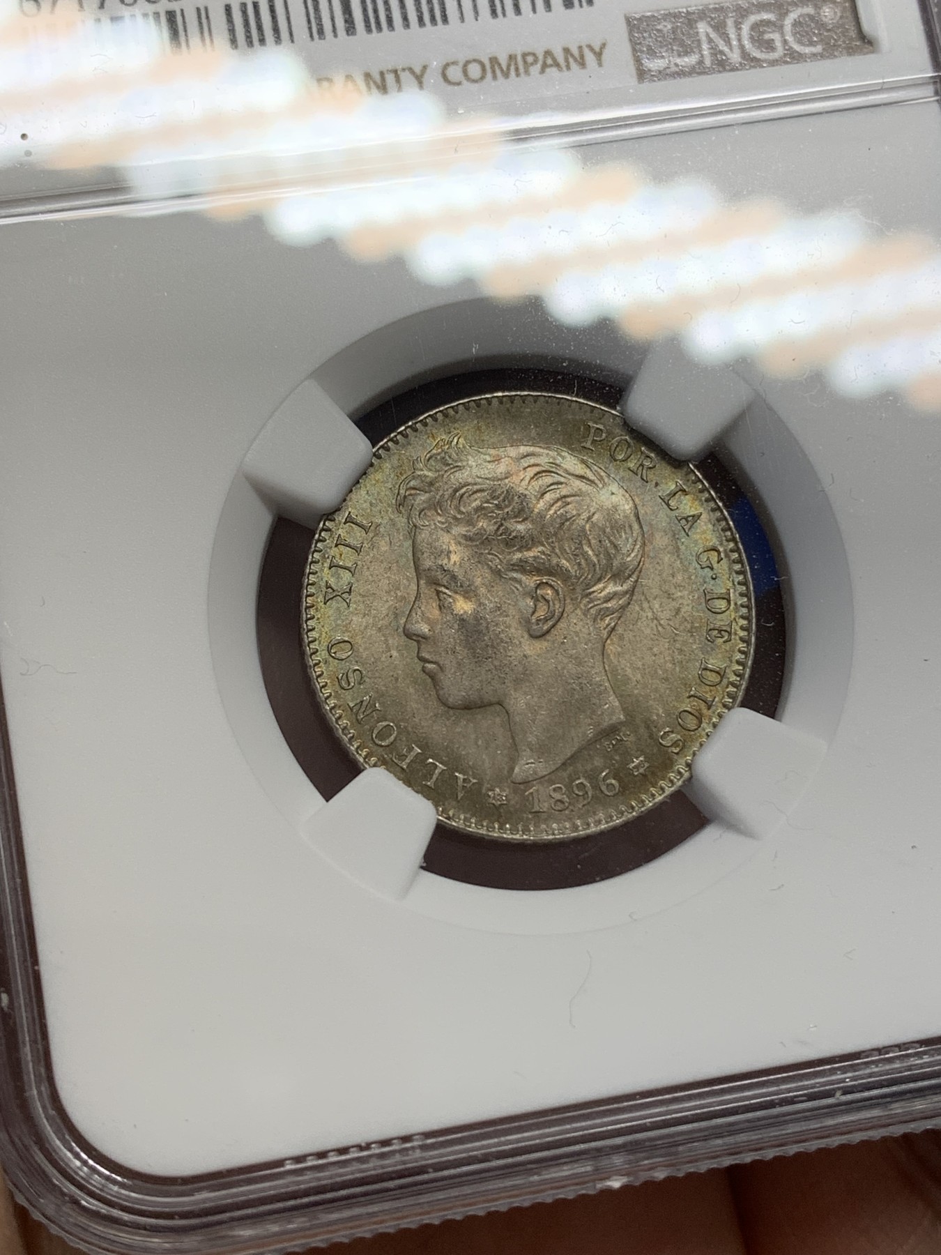 《竞宝斋》第215场-周日，周一 2场 (全场包邮) NGC MS64 西班牙1896年阿方索十三世1比塞塔银币 高分 五彩包浆 难得