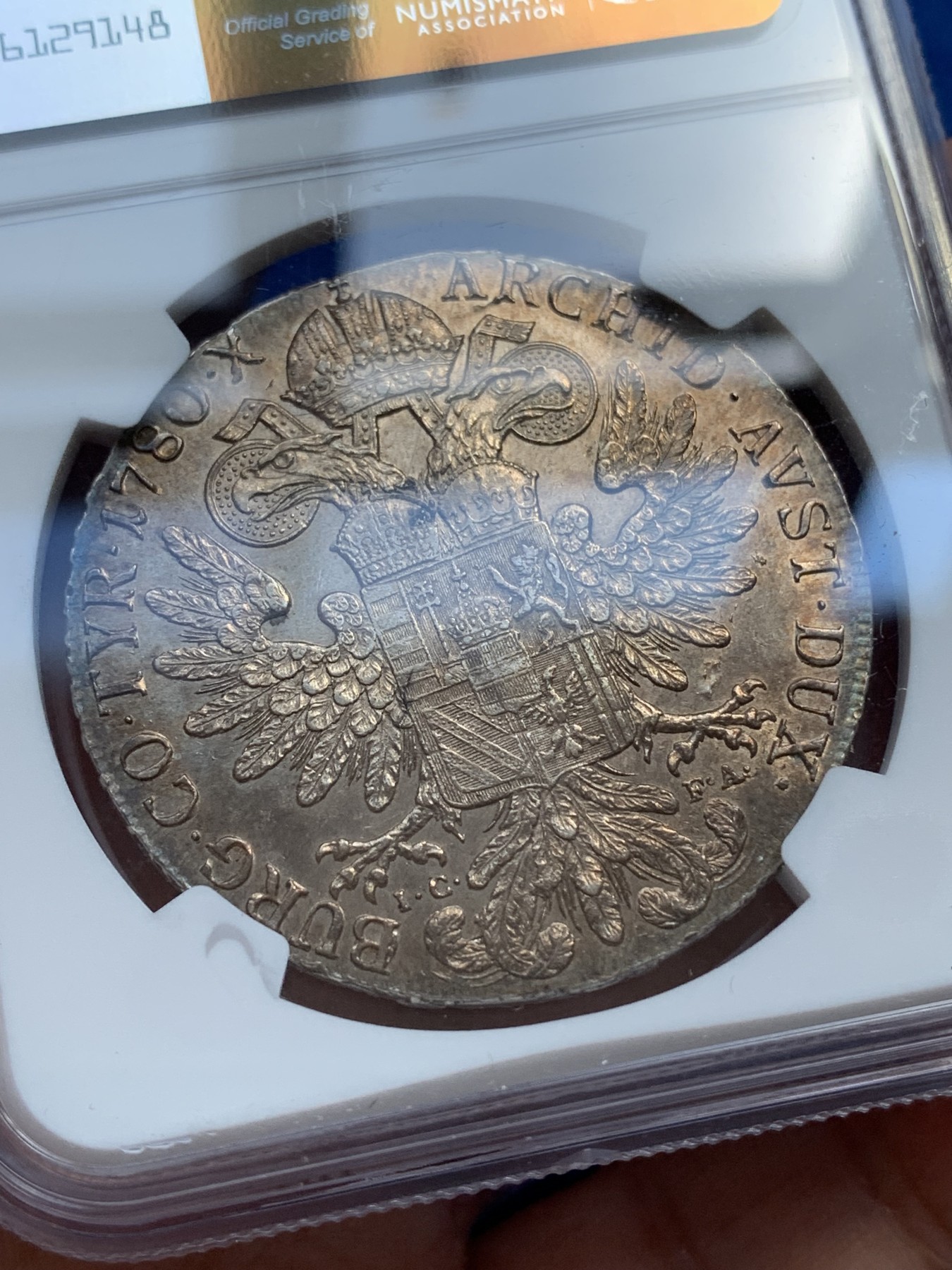 《竞宝斋》第215场-周日，周一 2场 (全场包邮) NGC-UNC 奥匈帝国 1780年 IC-FA版本 原铸玛利亚特蕾莎泰勒 金色五彩包浆，转光感明显