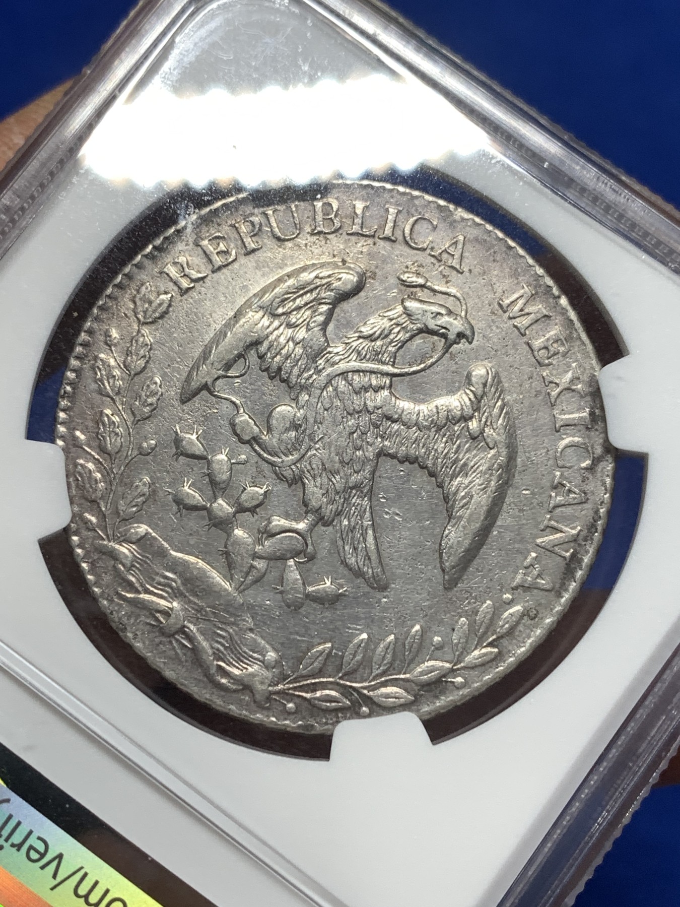 《竞宝斋》第215场-周日，周一 2场 (全场包邮) NGC AUD 墨西哥1879年鹰洋8R银币，图案整洁，齿边花纹依稀可见。