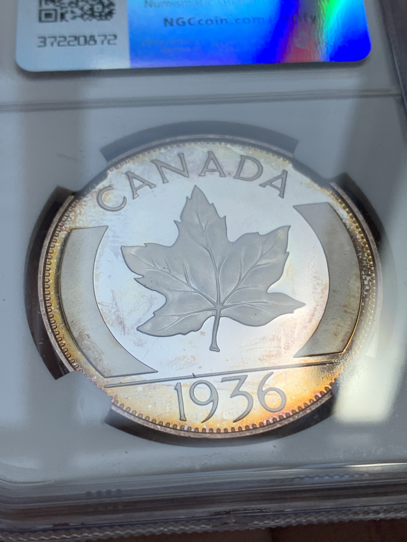 《竞宝斋》第215场-周日，周一 2场 (全场包邮) NGC-PF67 后铸加拿大1936爱德华八世 银质1克朗 NGC冠军分 币面的镜面感和凝霜感都非常完美