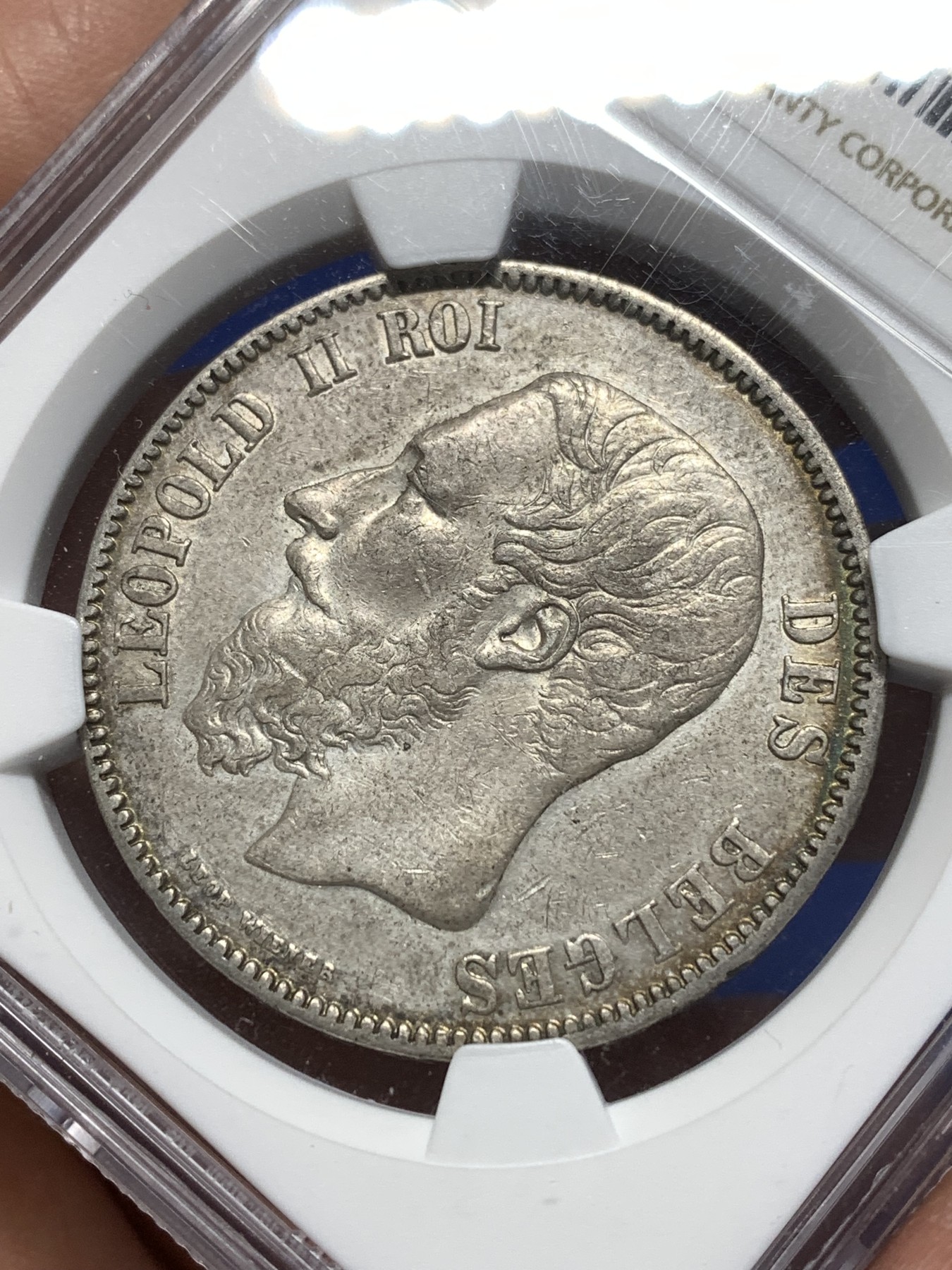 《竞宝斋》第215场-周日，周一 2场 (全场包邮) NGC AUD 比利时 1869年5法郎 利奥波德 大胡子银币 包浆极好，适合砸盒把玩