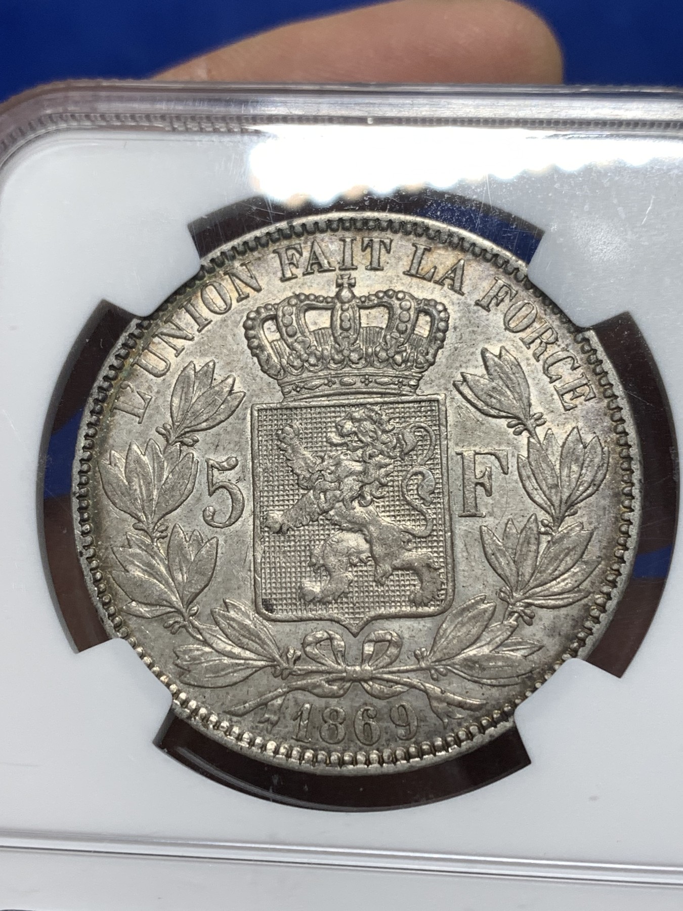 《竞宝斋》第215场-周日，周一 2场 (全场包邮) NGC AUD 比利时 1869年5法郎 利奥波德 大胡子银币 包浆极好，适合砸盒把玩