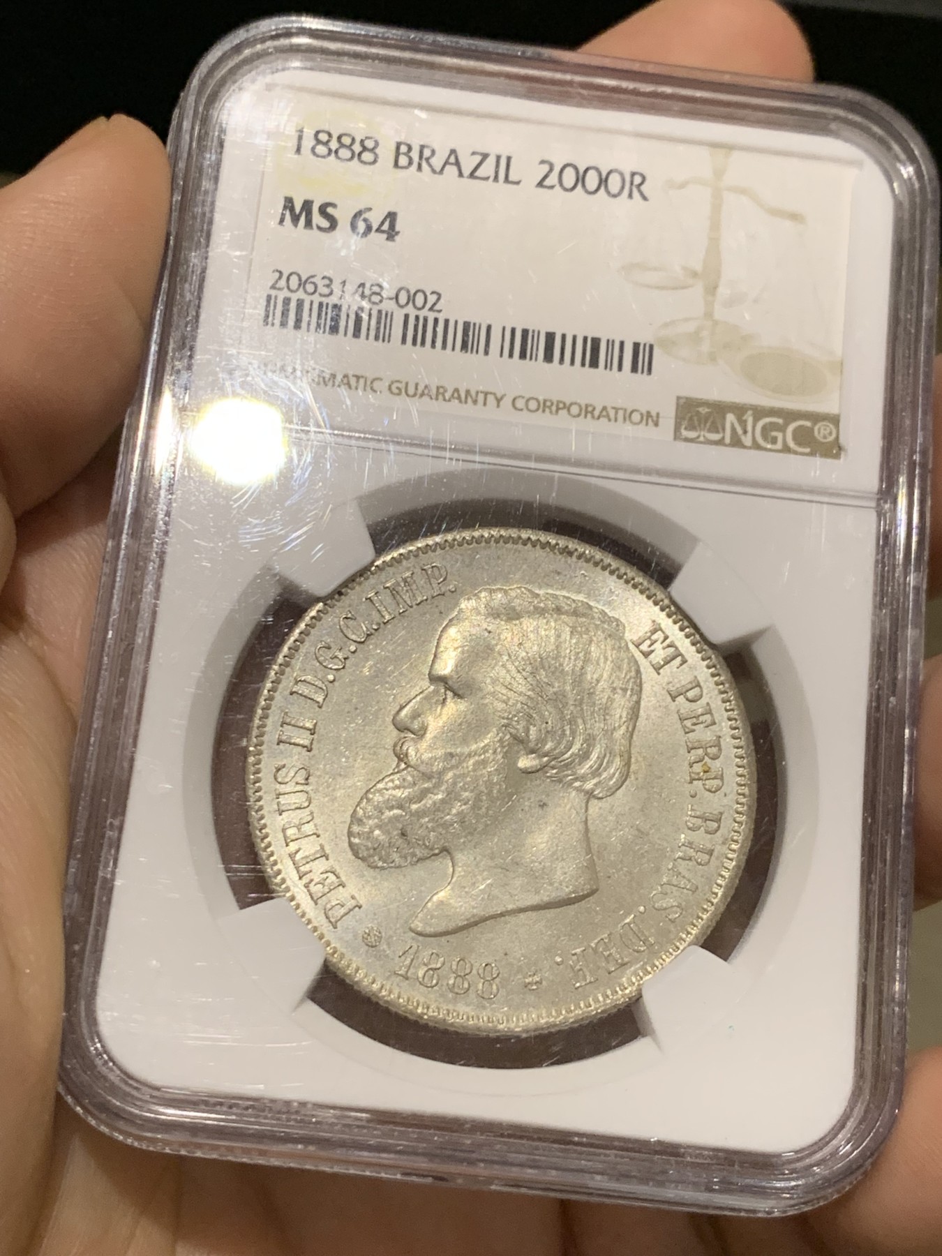 《竞宝斋》第215场-周日，周一 2场 (全场包邮) NGC-MS64 巴西 1888年2000瑞尔 佩德罗二世 大胡子银币 淡黄包浆 MS-64稀有高分一步到位 南美热点品种